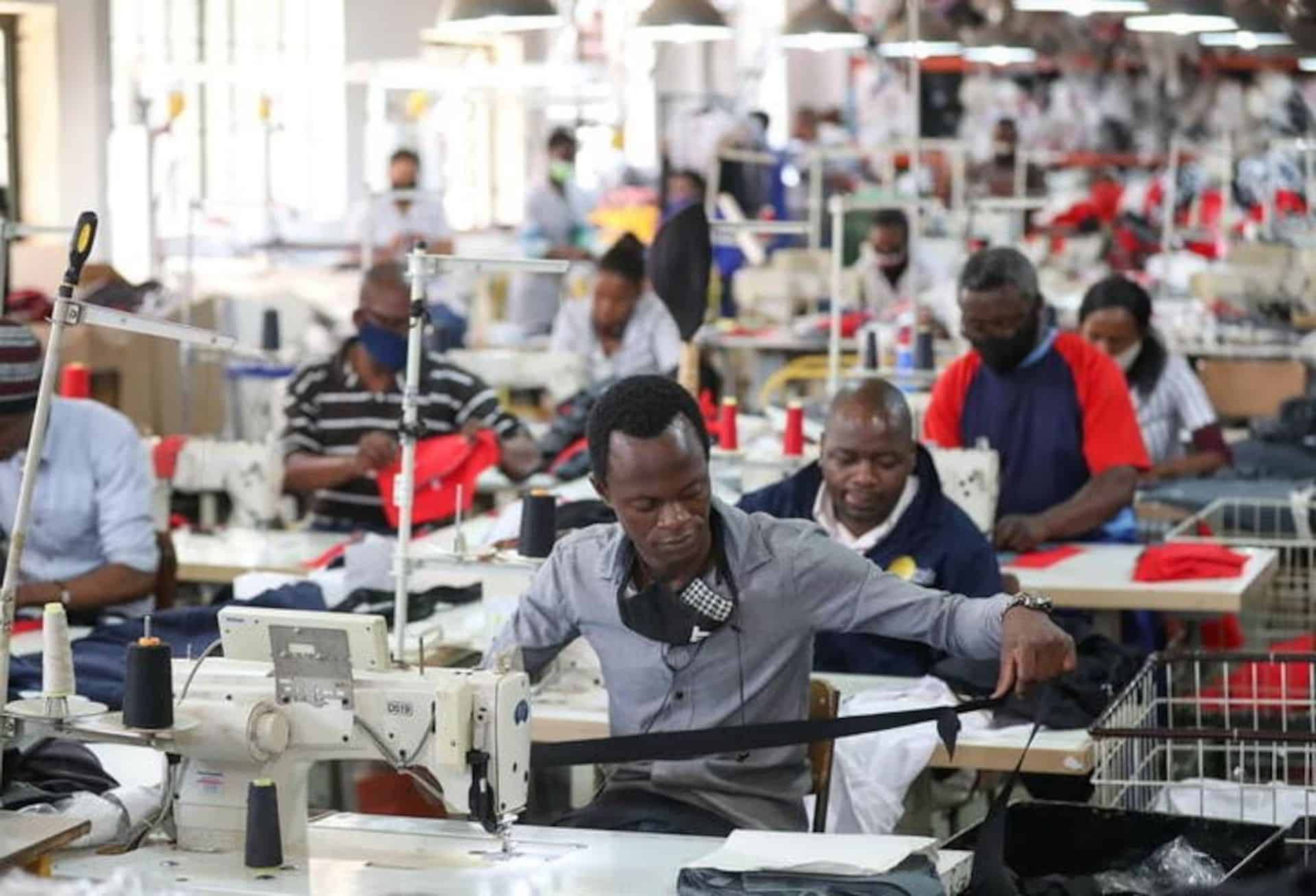 People work at ‘The Faktory,’ a fashion design and clothing manufacturing company in Johannesburg in this March 4, 2021. (Reuters/File)