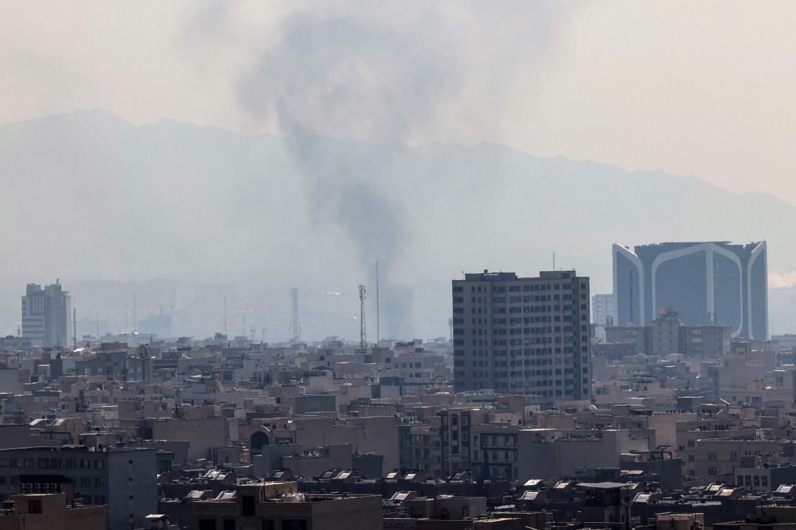 Above, smoke rises from the site of airstrikes in a central area of the Iranian capital Tehran on March 6, 2026. (AFP)