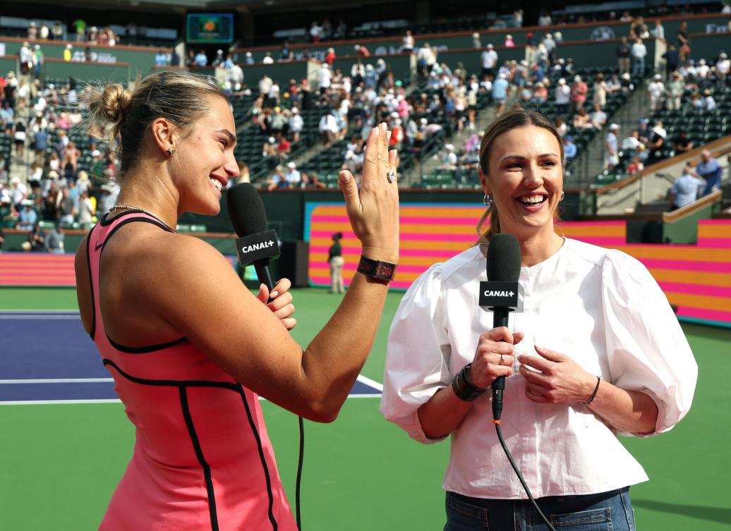 Aryna Sabalenka of Belarus shows off her engagement ring during a post-match interview after beating Himeno Sakatsume of Japan at the BNP Paribas Open on March 06, 2026. (Getty Images via AFP)
