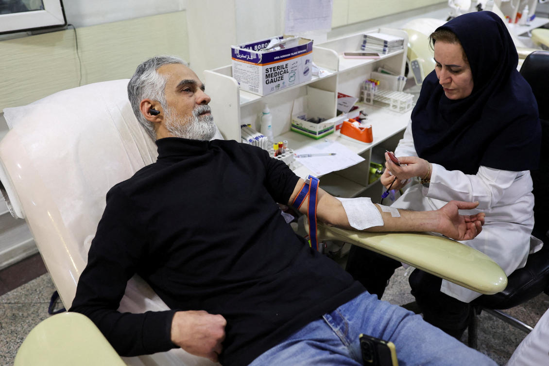 A man donates blood, amid the US-Israeli conflict with Iran, in Tehran, Iran, Mar. 7, 2026. (Reuters)
