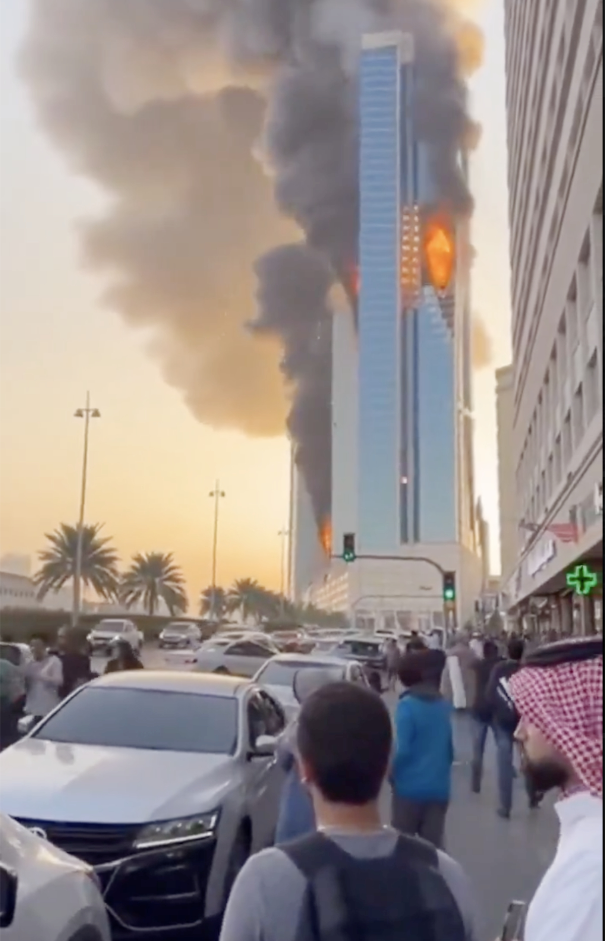An AI-generated video shows a Manama building on fire. (X)