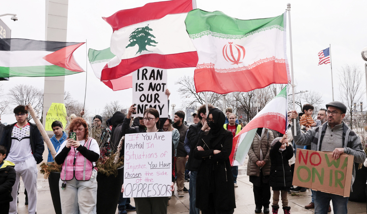 People gather for a Hands off Iran, Lebanon and Palestine rally and march in downtown Detroit, Michigan, on March 7, 2026. (AFP)