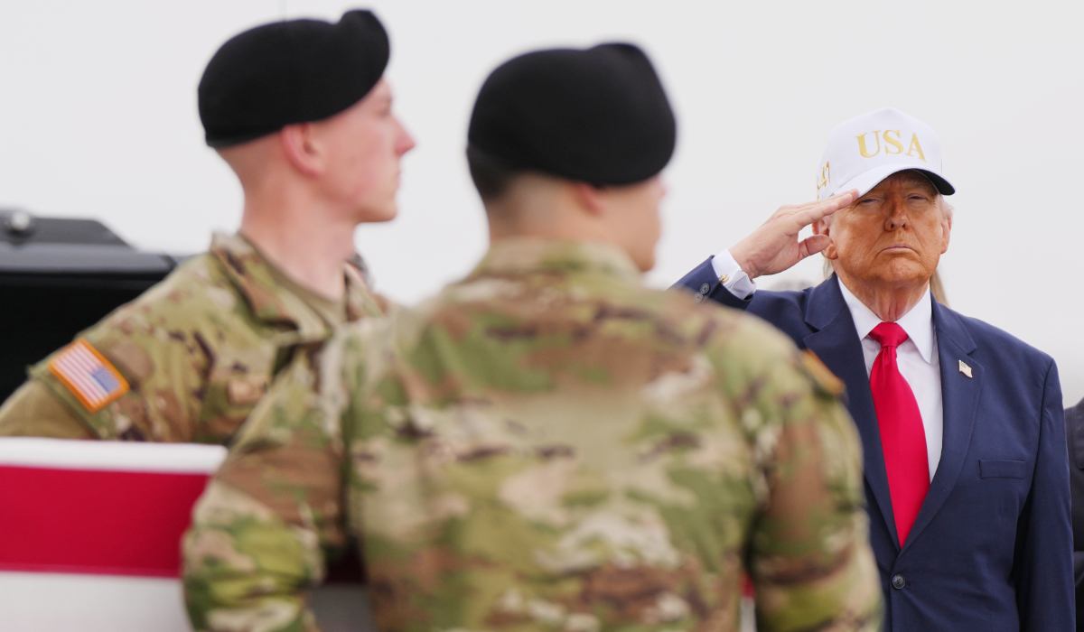 President Donald Trump salutes as an Army carry team moves the flag-draped transfer case containing the remains of U.S. Army Reserve Sgt. Declan Coady, 20, of West Des Moines, Iowa, who was killed in a drone strike at a command center in Kuwait, at Dover Air Force Base, Del. (AP)