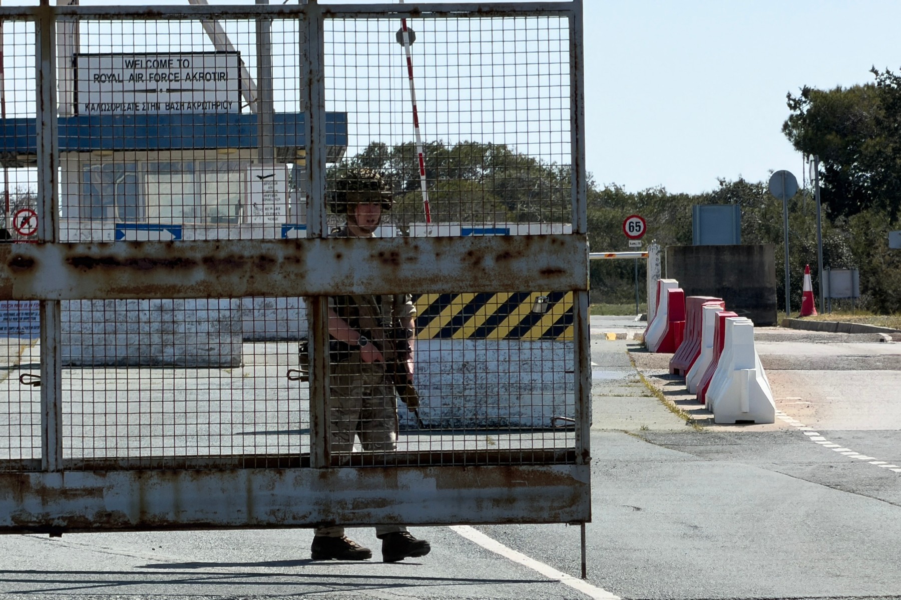 A British soldier mans a gate at RAF Akrotiri base following two reported drone attacks near Limassol, March 2, 2026. (AFP)