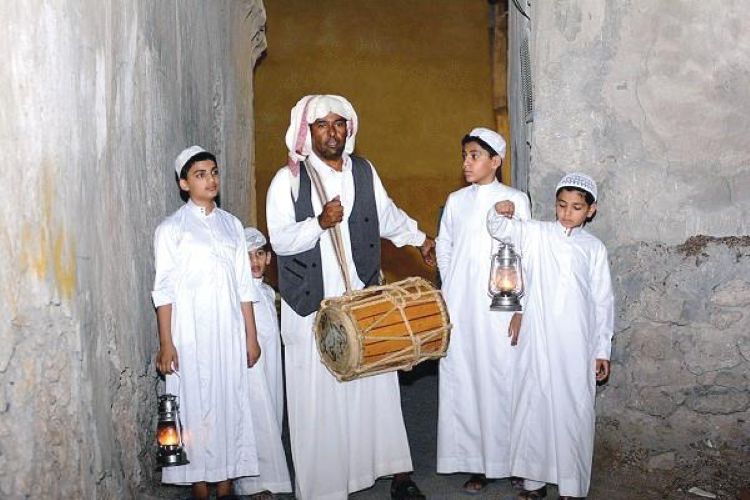 A mesaher is a man who would walk the street, beating his drum and singing, calling out for people to wake up for suhoor. (Alyaum)