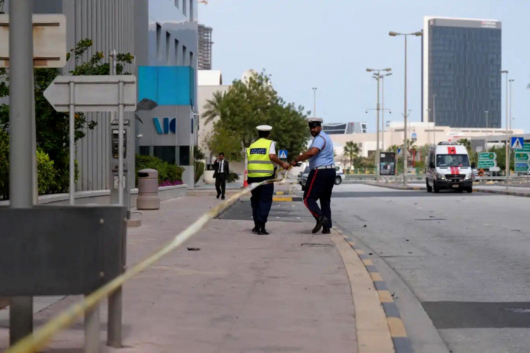 Bahraini police cordon off the area outside the damaged Crown Plaza hotel, following an Iranian military strike, in Manama, March 1, 2026. (AFP)