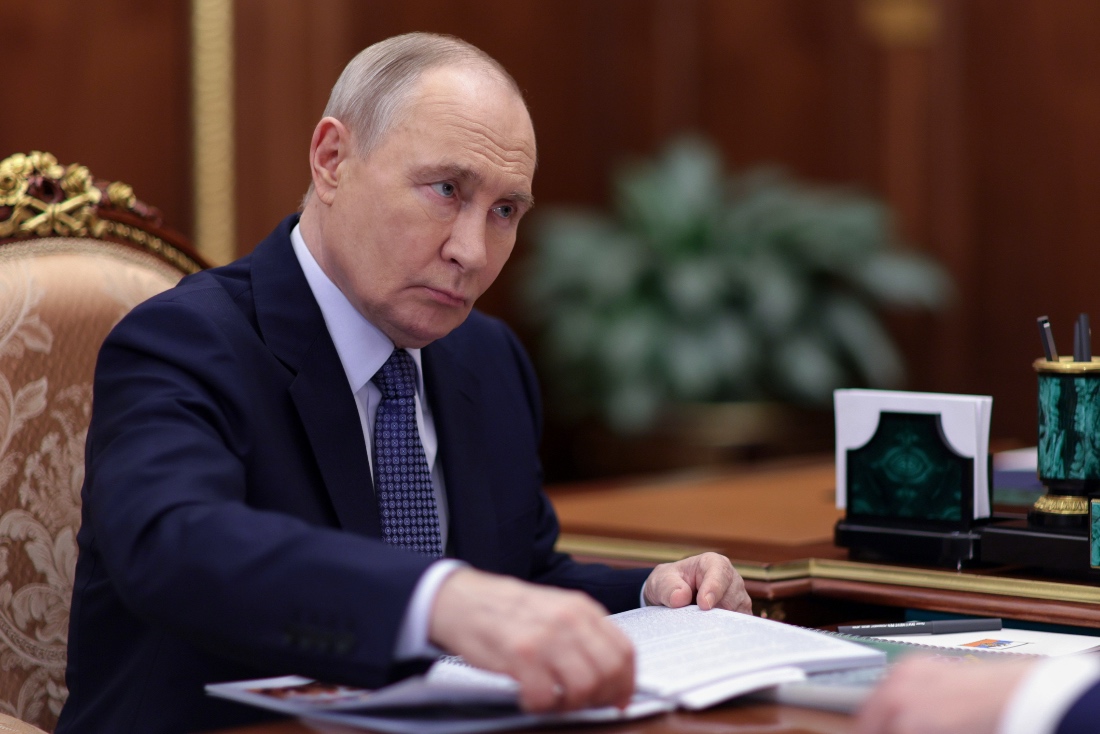 Russian President Vladimir Putin listens to Russian Investigative Committee head Alexander Bastrykin during their meeting at the Kremlin in Moscow, Russia. (AP)