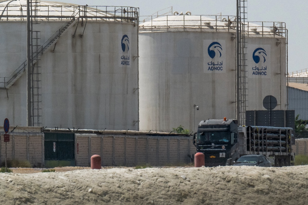 A truck drives past an ADNOC Gas — a subsidiary of the Abu Dhabi National Oil Company — facility in Abu Dhabi on March 3, 2026. (FILE/AFP)