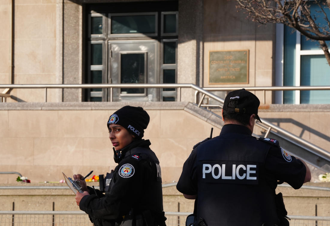 Toronto police investigate the scene after the US consulate was hit by gunfire in Toronto on Mar. 10, 2026. (AP)