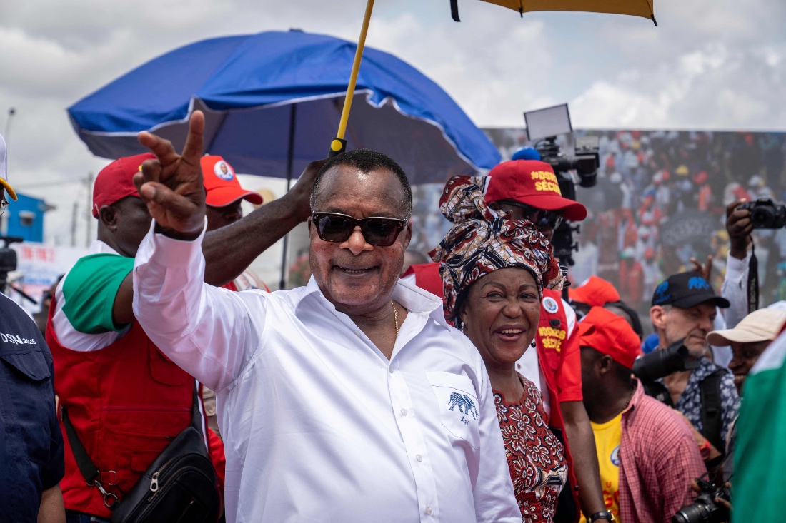 Republic of Congo’s incumbent President and presidential candidate for the ruling Congolese Labour Party, Denis Sassou Nguesso, salutes supporters during a rally launching his election campaign in Pointe-Noire, Congo. (AFP)