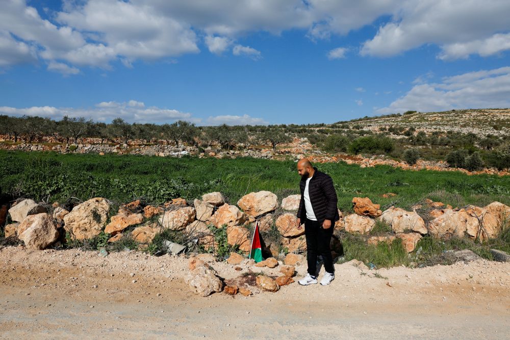 Mousa Hamayel stands near the spot where Thaer Hamayel was killed during an attack by Israeli settlers on Palestinians in Khirbet Abu Falah, near Ramallah, West Bank, Mar. 9, 2026. (Reuters)