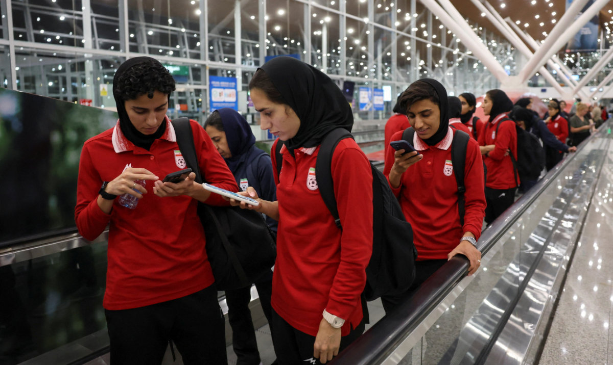 Members of the Iranian women's national soccer team arrive at Terminal 1 of Kuala Lumpur International Airport after attending a match in Group A of the AFC Women's Asian Cup in Australia, at Sepang, Malaysia, March 11, 2026. (Reuters)