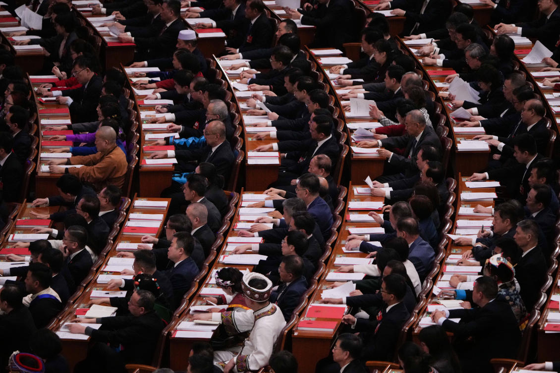 Delegates attend the closing session of the National People's Congress (NPC) at the Great Hall of the People in Beijing, China, Thursday, March 12, 2026. (AP)