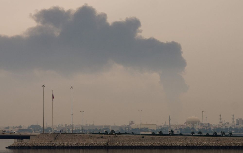 A plume of smoke rises after an Iranian strike on fuel tanks in Muharraq, Bahrain, Mar. 12, 2026. (AFP)