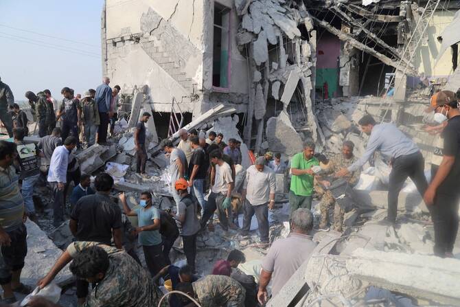 People and rescue forces work following a reported strike on a school in Minab, Iran, February 28, 2026. (Reuters/File)