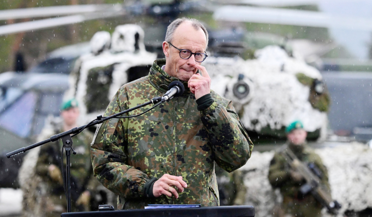 German Chancellor Friedrich Merz delivers a press conference during a visit at the Bardufoss Airbase in Norway on March 13, 2026. (AFP)