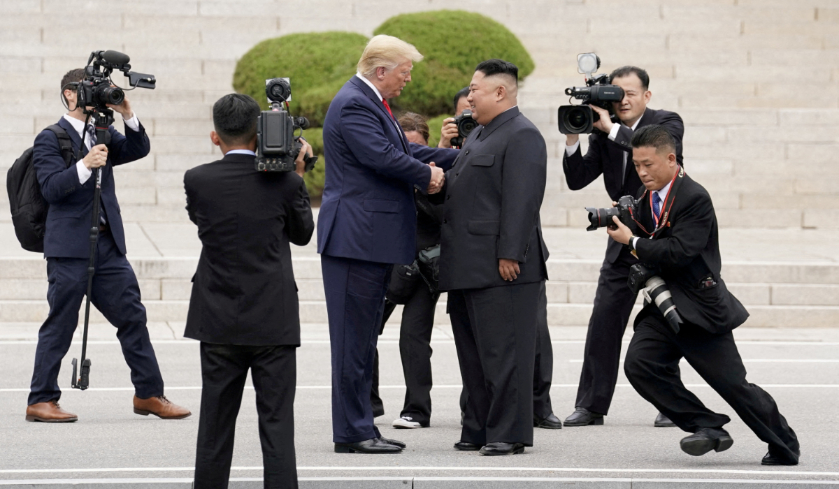 U.S. President Donald Trump meets with North Korean leader Kim Jong Un at the demilitarized zone separating the two Koreas, in Panmunjom, South Korea, June 30, 2019. (REUTERS)