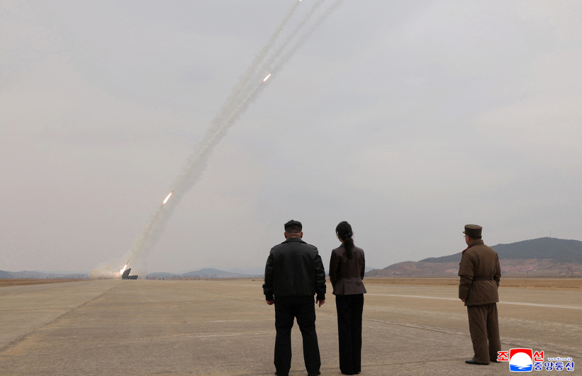 North Korean leader Kim Jong Un, accompanied by his daughter Kim Ju Ae, oversees the test-launch of 600 mm-calibre multiple rocket launchers, North Korea, March 14, 2026. (REUTERS)