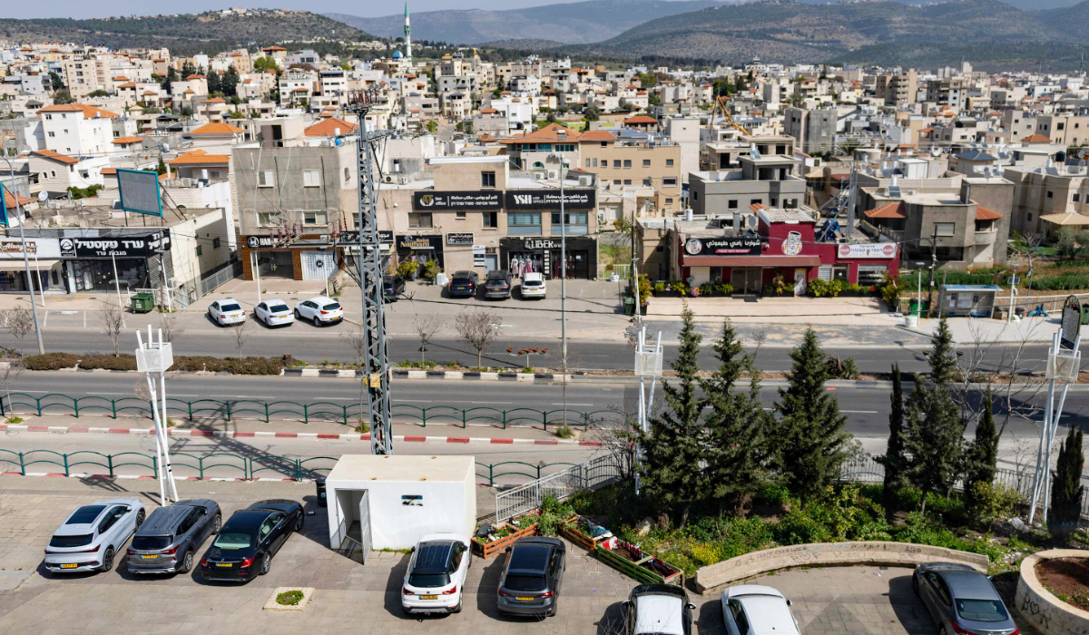 A bomb shelter is seen within a public parking space in the Arab town of Sakhnin in northern Israel near the Lebanese border on March 12, 2026. (AFP)