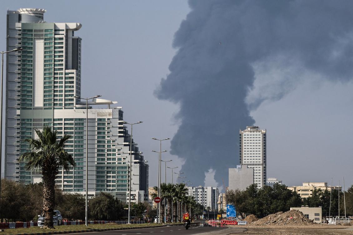 Smoke could be seen rising from the direction of a major UAE energy installation on March 14, 2026 in what appeared to be the latest strike targeting the Gulf’s petroleum facilities hours after the US struck Iran’s Kharg Island. (AFP)