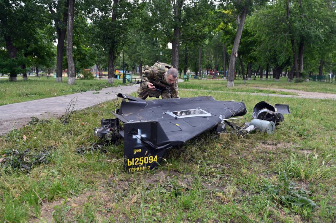 A Ukrainian explosives expert examines parts of a Shahed 136 military drone that fell down following an air-attack in Kharkiv on June 4, 2025, amid the Russian invasion of Ukraine. (AFP file photo)