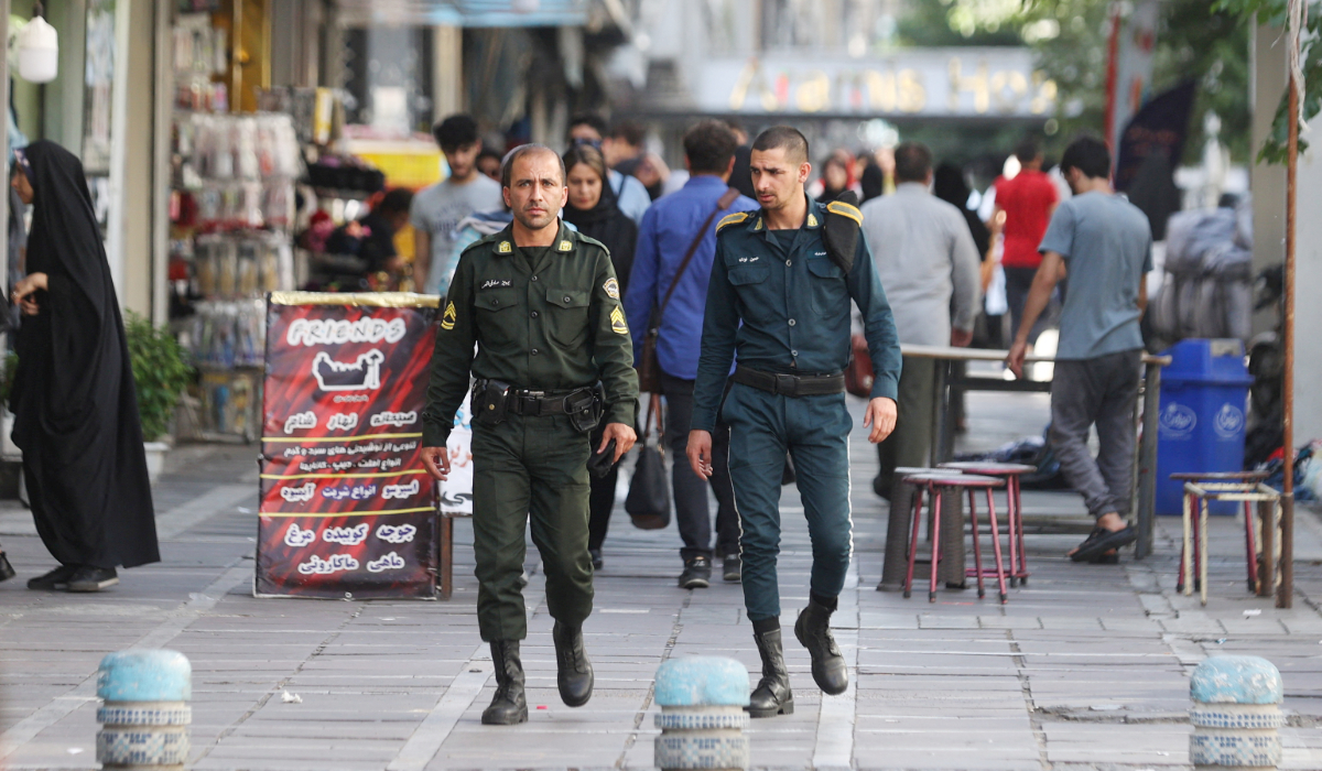 Iran's police forces walk on a street during the revival of morality police in Tehran, Iran, July 16, 2023. (REUTERS)