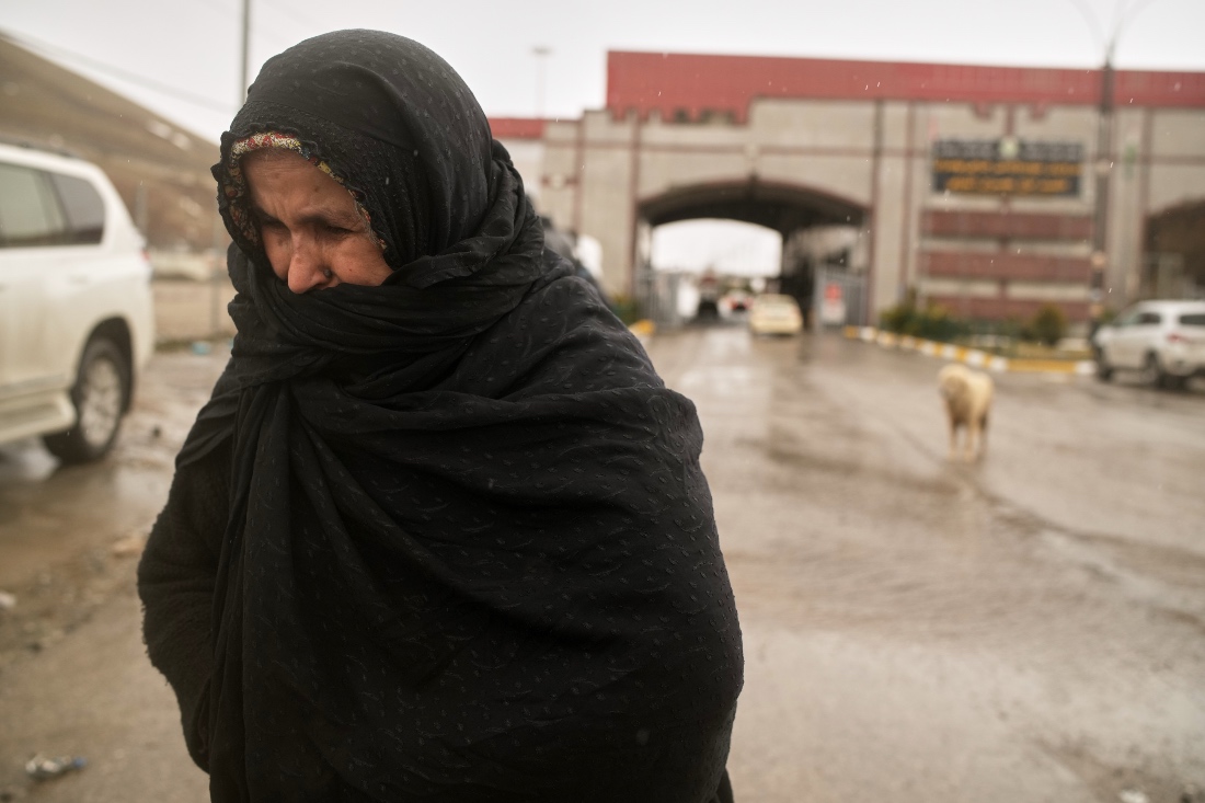 Iranian Kurdish Mariam arrives at the Iraqi side of the Haji Omeran border crossing between Iran and the autonomous Kurdistan Region of Iraq. (AP)
