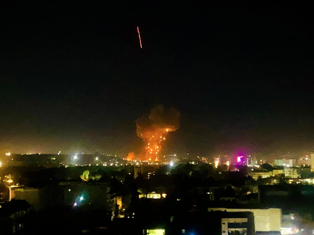 This photograph shows smoke and flames rising from an area hit by airstrikes, in Kabul on March 16, 2026. (AFP)