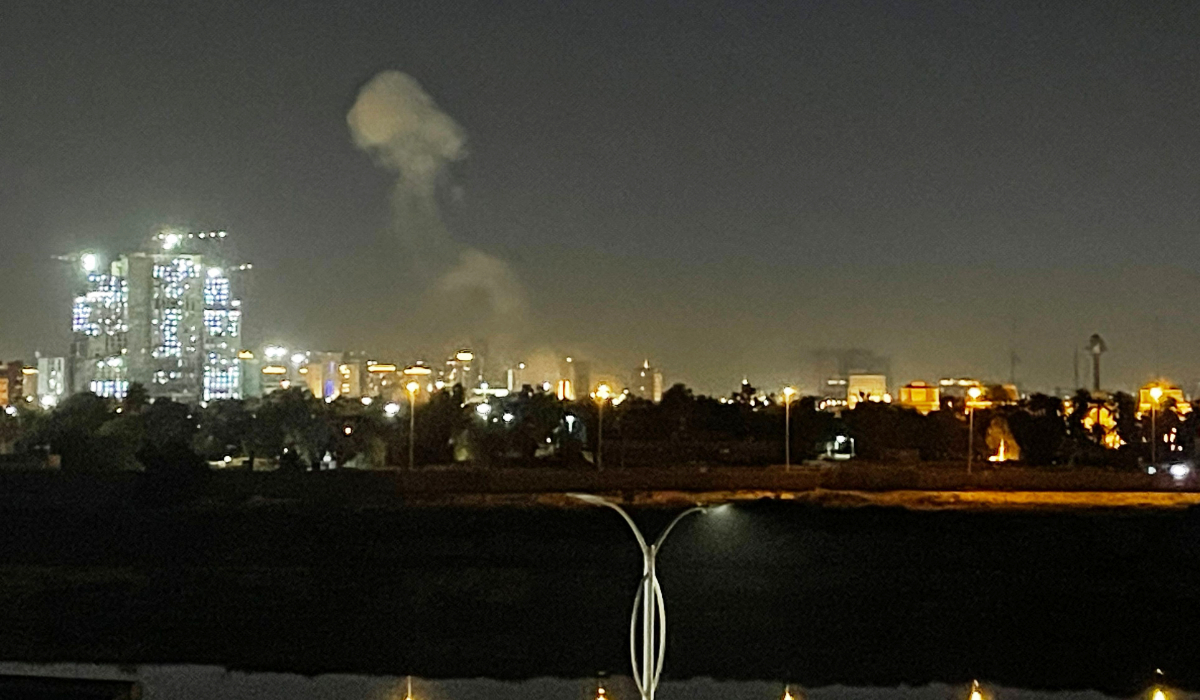 A plume of smoke rises over the Iraqi capital Baghdad on March 16, 2026. (AFP)