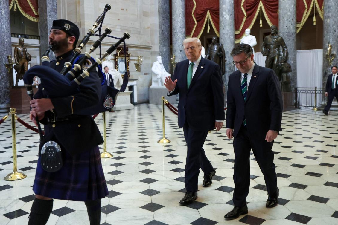 President Trump and Speaker of the House Mike Johnson depart from the annual Friends of Ireland Luncheon, in Washington on Tuesday. (AFP)