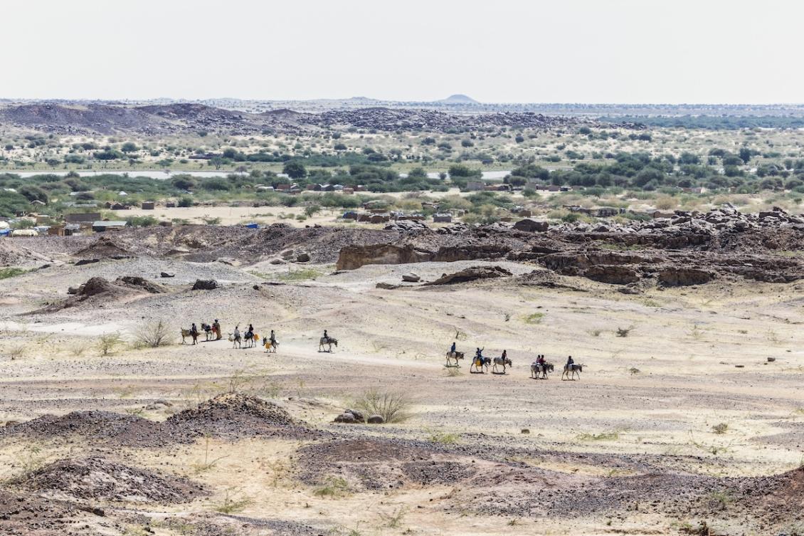 Sudanese refugees ride donkeys on the road between the lake and Oure Cassoni camp in Chad, on November 14, 2025. (FILE/AFP)
