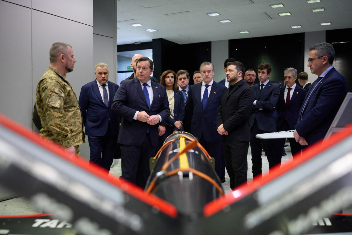 This handout photograph taken and released by Ukrainian Presidential Press Service in Madrid on Mar. 18, 2026 shows the President Volodymyr Zelensky (C-R) meeting with the Leadership of the Spanish Sener Group to Discuss Strengthening Ukraine’s Air Defense. (AFP)