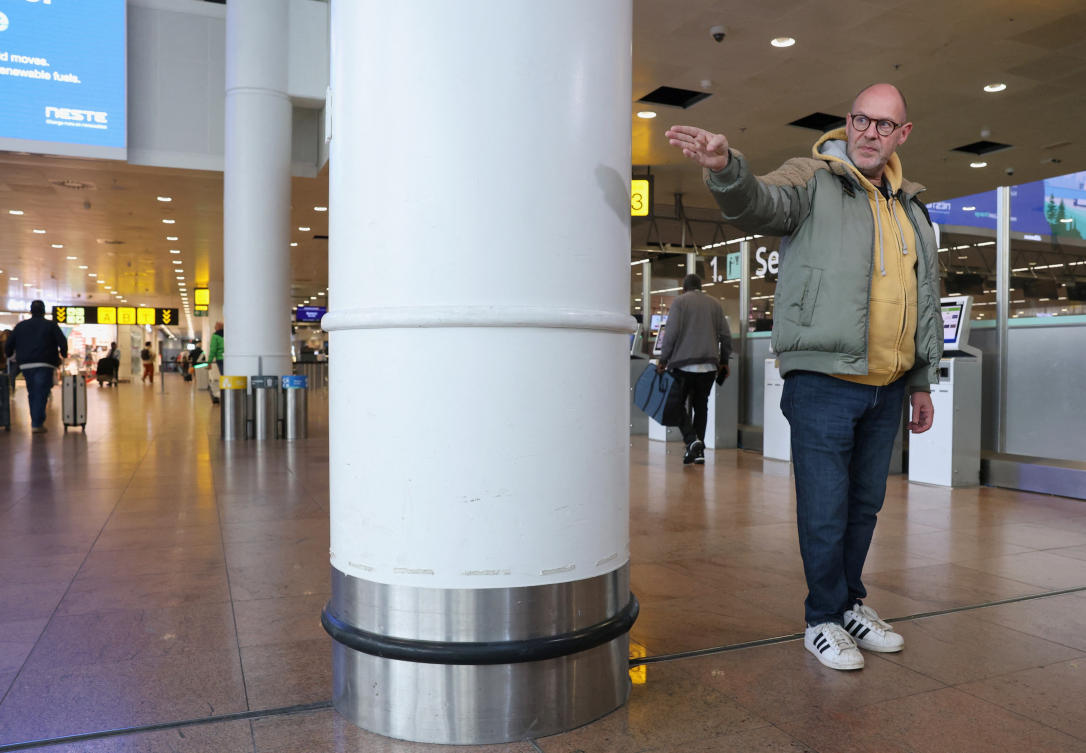 Belgian Walter Benjamin, who lost a leg in the Mar. 22, 2016 suicide bomb attack at Brussels Airport, talks to Reuters while standing where he was during the blast as Belgium prepares to mark the 10th anniversary of the attack, at Brussels Airport, Mar. 10, 2026. (Reuters)