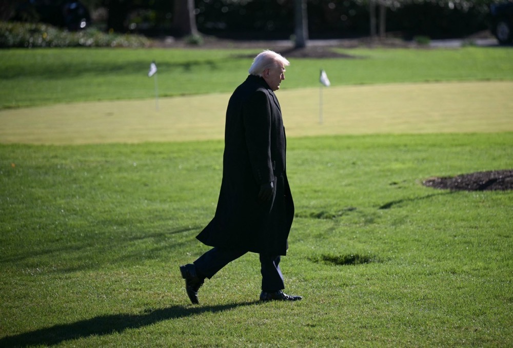 US President Donald Trump walks to the Oval Office at the White House in Washington, DC. (AFP)