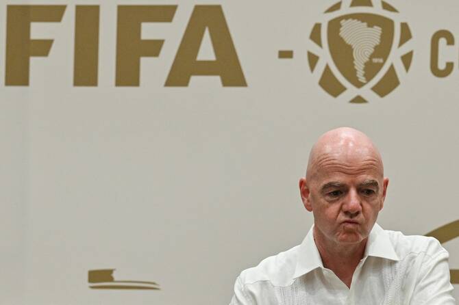 FIFA president Gianni Infantino on Thursday underlined the body’s commitment to making sure the World Cup goes ahead “as scheduled” with “all teams” taking part amid doubts about Iran’s presence at the tournament. (AFP/File)