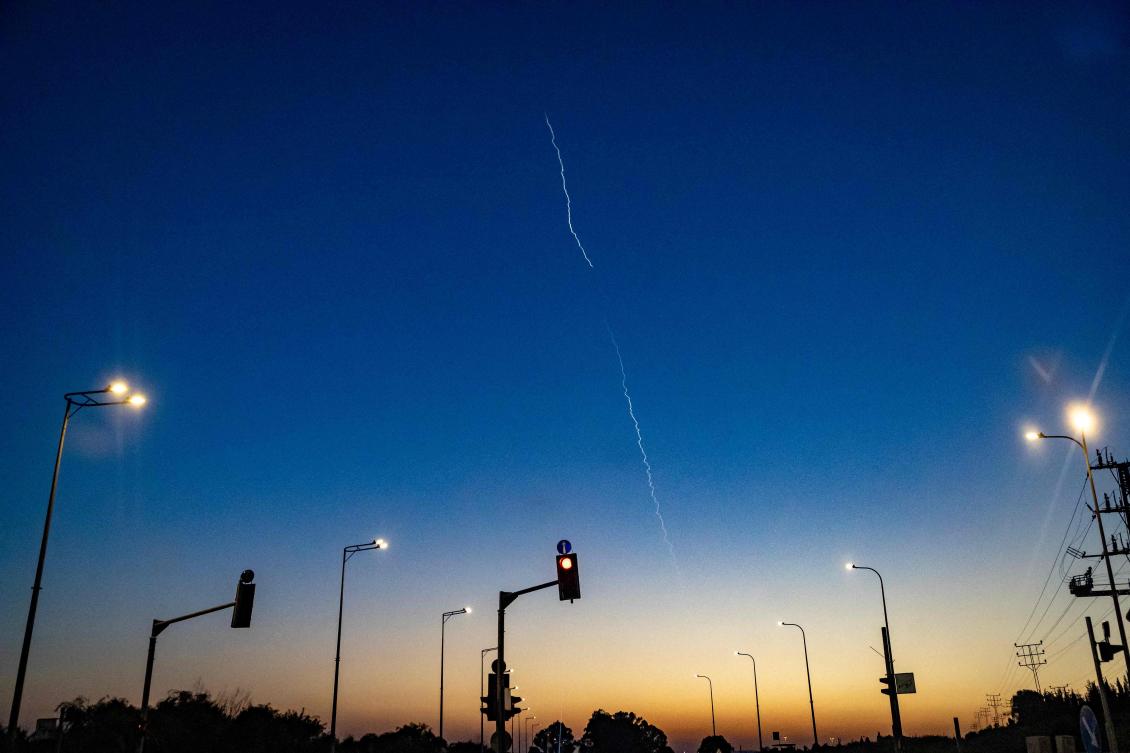 Above, a rocket trail from Israel’s Iron Dome missile defense system is seen in the sky near Afula, northern Israel on March 17, 2026. (AFP)