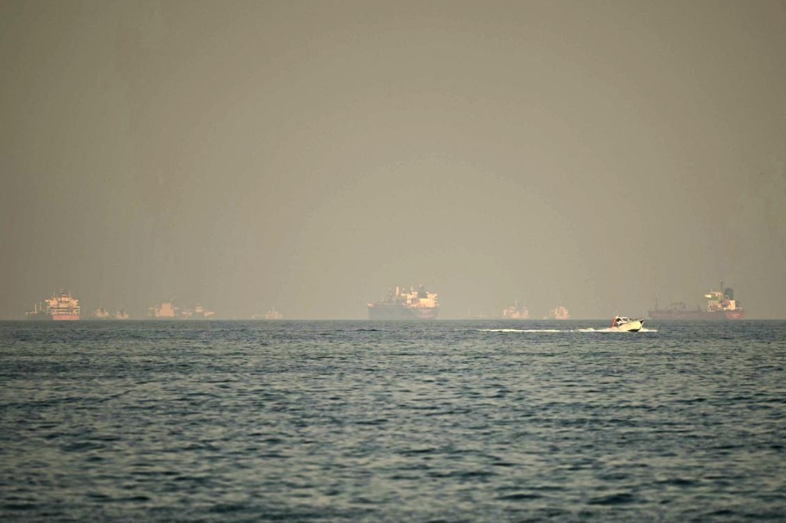 Around 20,000 seafarers remained stranded on some 3,200 vessels west of the Strait of Hormuz, according to the UN’s maritime body. Above, cargo ships and tankers off the coast of Fujairah in the Strait of Hormuz on Feb. 25, 2026. (AFP file photo)