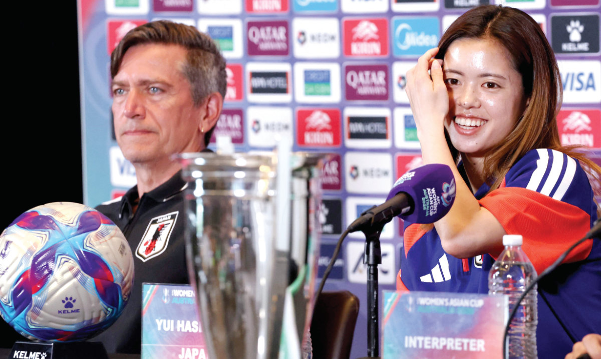 Japan’s head coach Nils Nielsen, left, and captain Yui Hasegawa during a press conference in Sydney Friday ahead of the 2026 AFC Women’s Asian Cup final between Japan and Australia on Saturday. (AFP)