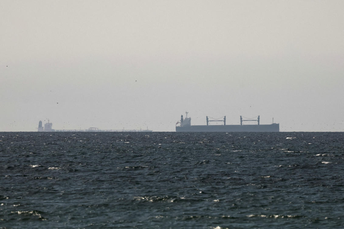 A cargo ship in the Gulf, near the Strait of Hormuz, as seen from northern Ras Al-Khaimah, near the border with Oman’s Musandam governance, amid the US-Israeli conflict with Iran, in UAE, Mar. 11, 2026. (Reuters)
