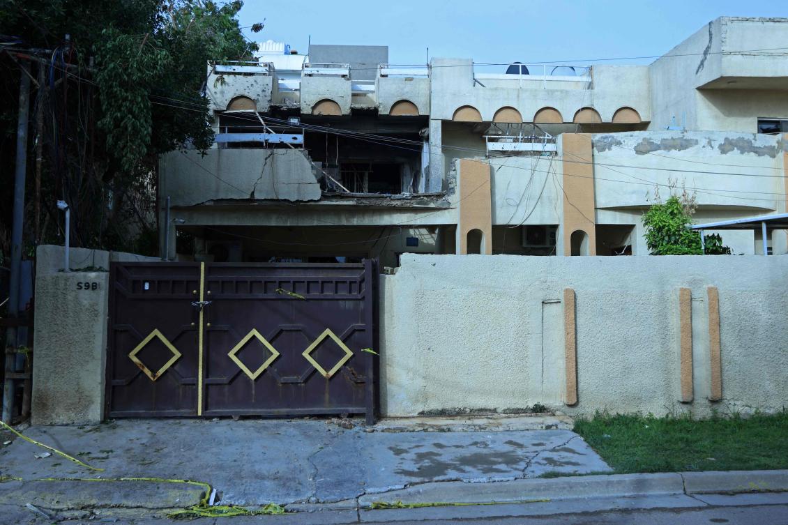 Above, a house that was damaged by a drone strike in the Al-Saydiya neighborhood of Baghdad on March 22, 2026.(AFP)