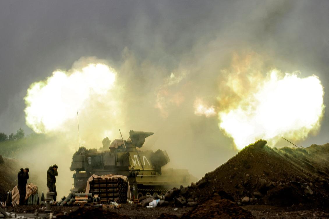 An Israeli self-propelled howitzer artillery gun fires rounds toward southern Lebanon from a position in the upper Galilee in northern Israel near the border on March 20, 2026. (AFP)