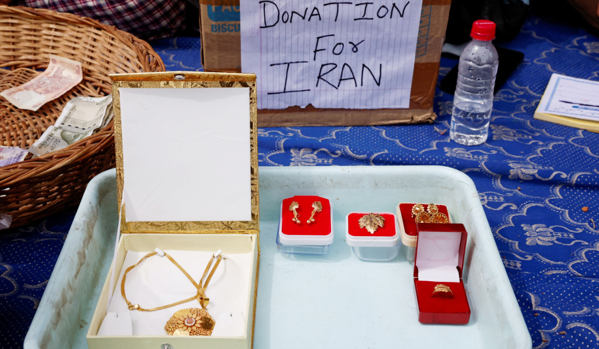 Gold jewellery is displayed outside an Imambara fund collection centre as people raise funds to support Iran, amid the U.S.-Israeli conflict with Iran, in Srinagar, Indian Kashmir, March 23, 2026. (REUTERS)