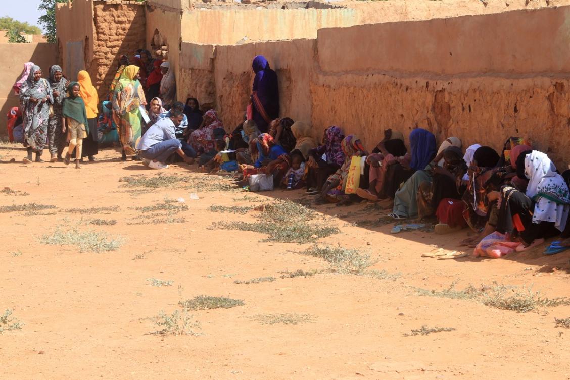 Displaced people from the towns of Bara and Umm Dam Haj Ahmed in North Kordofan State take shelter in Omdurman, part of greater Khartoum, on November 10, 2025. (AFP)