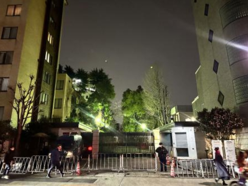 An entrance to the Chinese Embassy is seen in Tokyo on March 24, 2026, after a man was apprehended after he trespassed onto the embassy premises. (AFP)