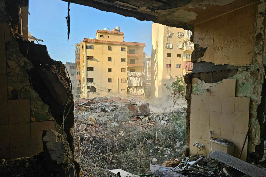 Destruction is seen at the site of an overnight Israeli airstrike that targeted the Burj al-Barajneh neighbourhood in the southern suburbs of the Lebanese capital Beirut on March 24, 2026. (Photo by AFP) /
