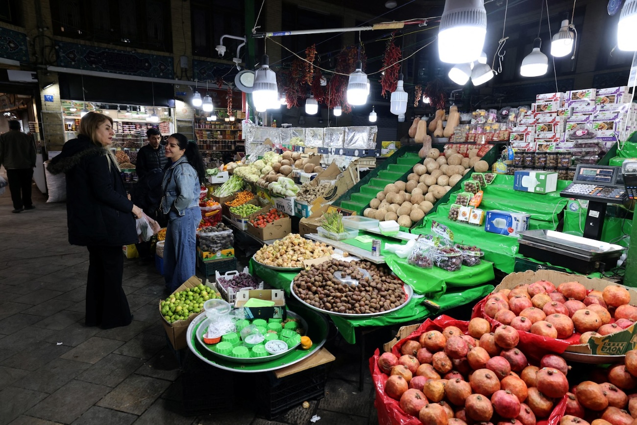 Iranians shop for food at the Tajrish Bazaar, one week after the start of the US-Israel attack on Iran, in Tehran on March 7, 2026. (File/AFP)