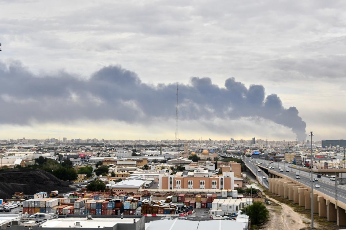 Above, smoke rises from Kuwait international airport after a drone strike on fuel storage in Kuwait earlier on March 25, 2026. (AP)