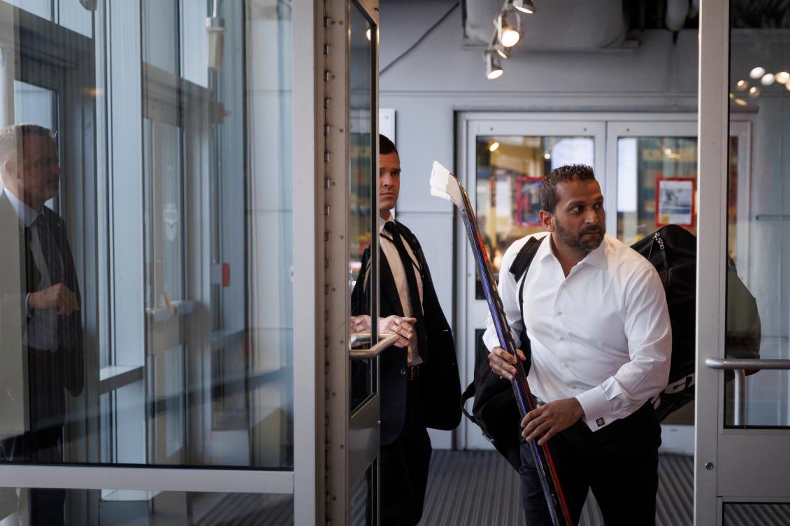 FBI Director Kash Patel walks to the locker room ahead of the annual lawmakers vs. lobbyist Congressional Hockey Challenge charity hockey game in Arlington. His email account was hacked by an Iran-linked group. (AP)