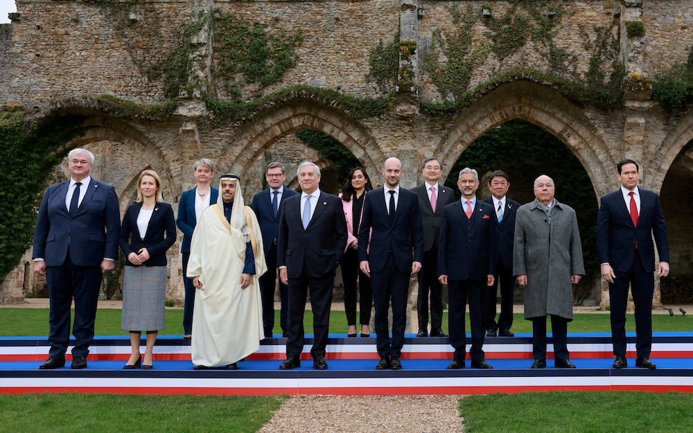 The foreign ministers of G7 and invited nations - including Saudi Arabia's Prince Faisal bin Farhan (third from left) - pose for a family photo on the second day of the G7 Foreign Ministers' Meeting in Vaux-de-Cernay Abbey in Cernay-la-Ville near Paris. (Reuters)