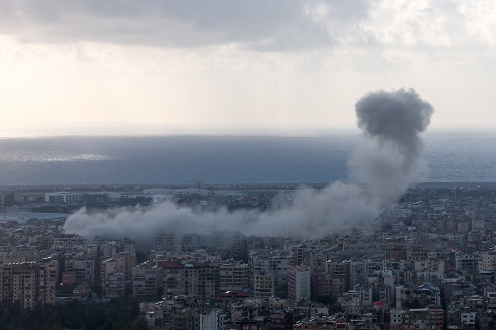 Smoke rises from Beirut’s southern suburbs following an Israeli strike. (Reuters)